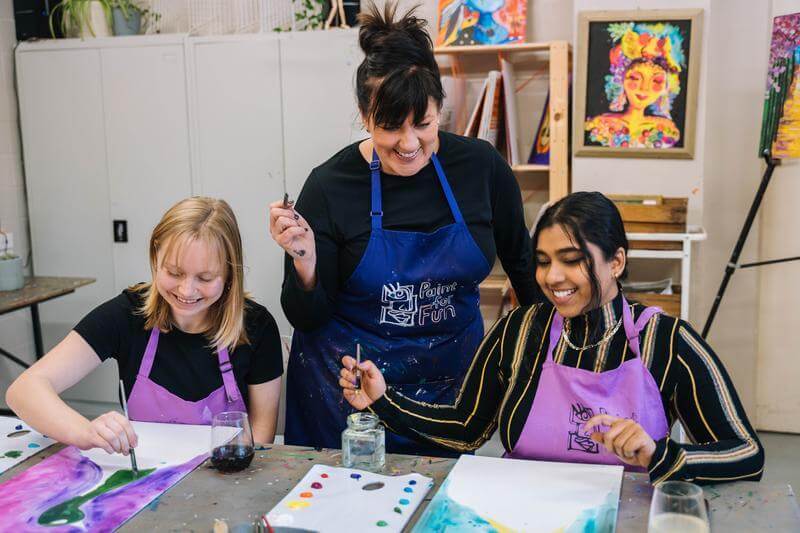 Creative workshop teacher and students